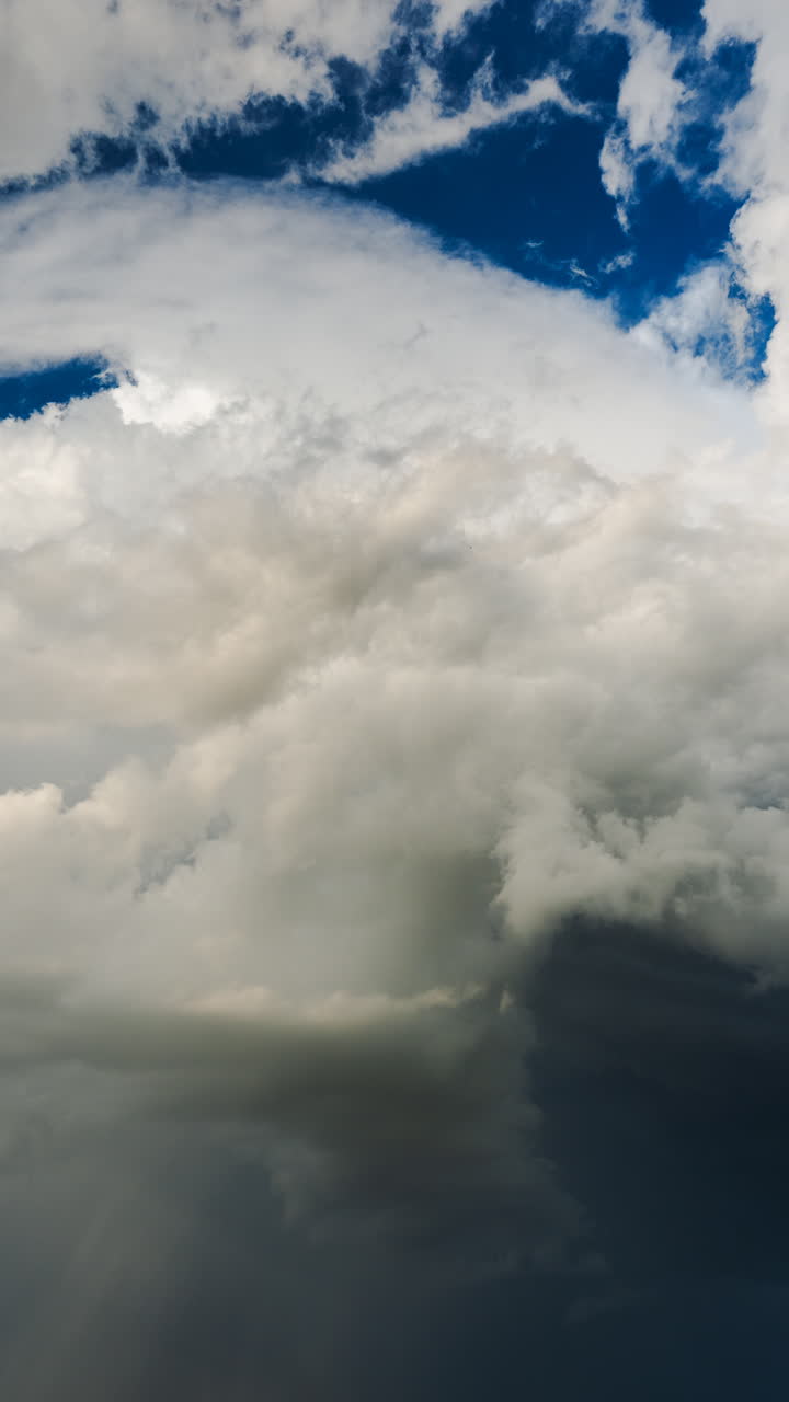 Dense grey clouds drifting across the sky creating immersive motion