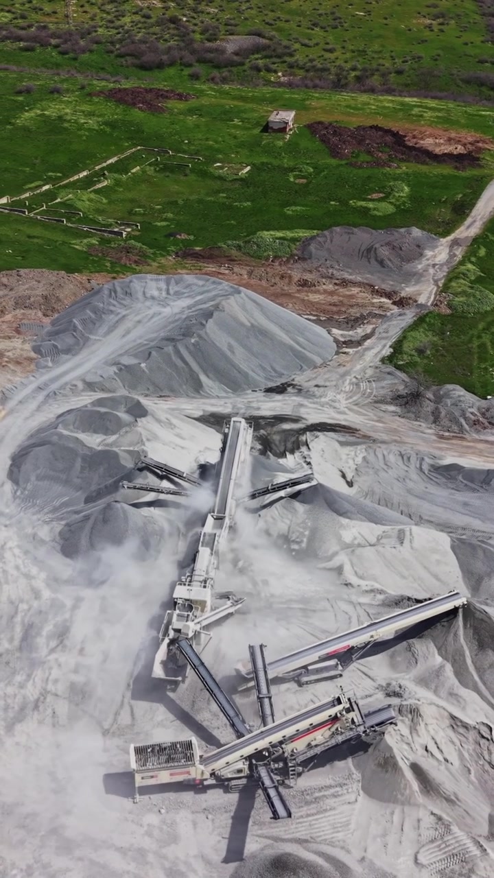 Top down view of crushing machinery in granite quarry
