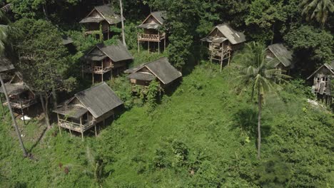 aerial orbit of empty tourist thai bungalows due to pandemic travel restrictions