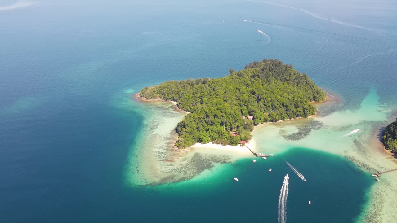 Aerial Overhead View Of Sapi Island On Clear Sunny Day