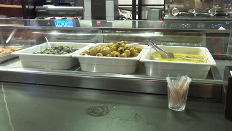 selection of olives and seafood appetizers