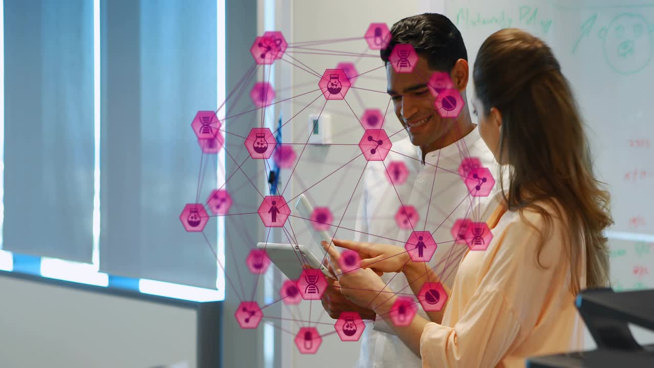 Coworkers tapping tablets during business meeting, causing pink overlay connecting icons for review