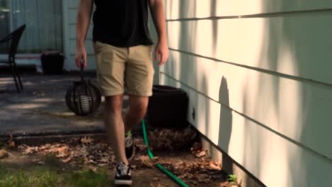 Man-walking-with-candle-in-early-autumn