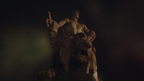 epic, ancient stone statue at night