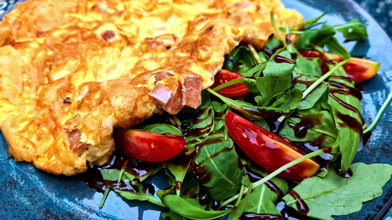 Delicious Omelette with Arugula Salad and Balsamic Glaze