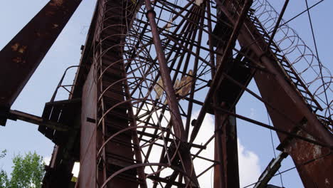 abandoned metal structure in pripyat, tilt-up close up view