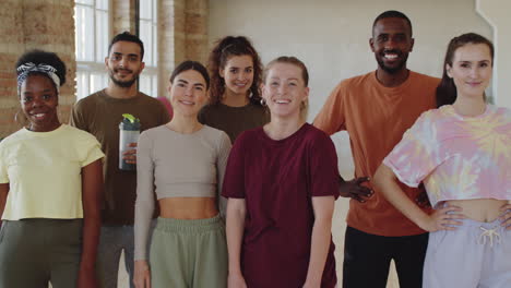 portrait of group of happy multiethnic people in dance class