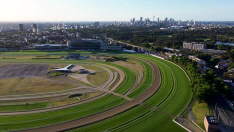 drone aerial scenic view royal randwick racecourse cbd city skyline track equestrian grass horse racing field sydney nsw eastern suburbs randwick kensington australia 4k