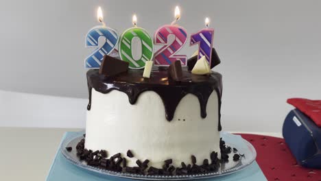 cake with candles for new year 2021