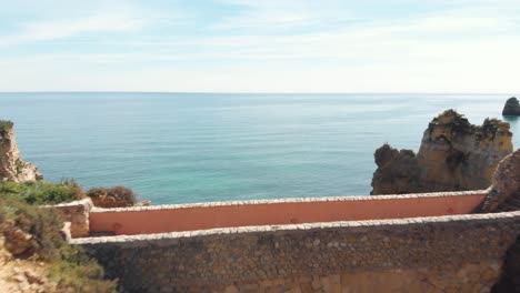 arch bridge at paria dos estudantes, lagos, algarve