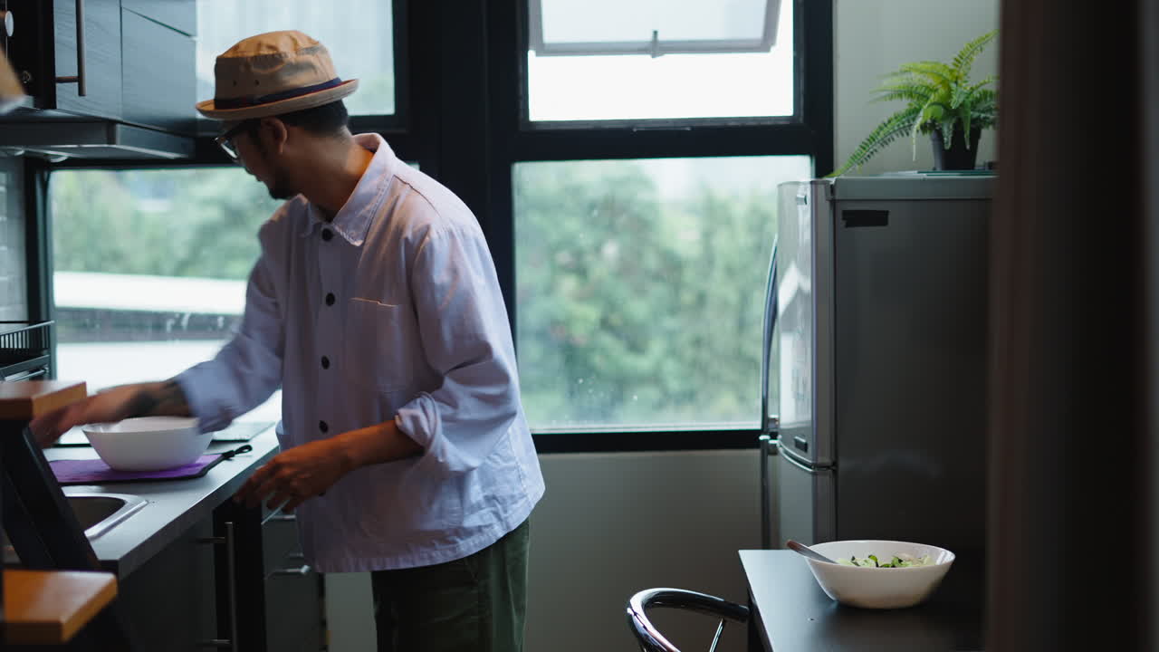 Man Cooking in Kitchen