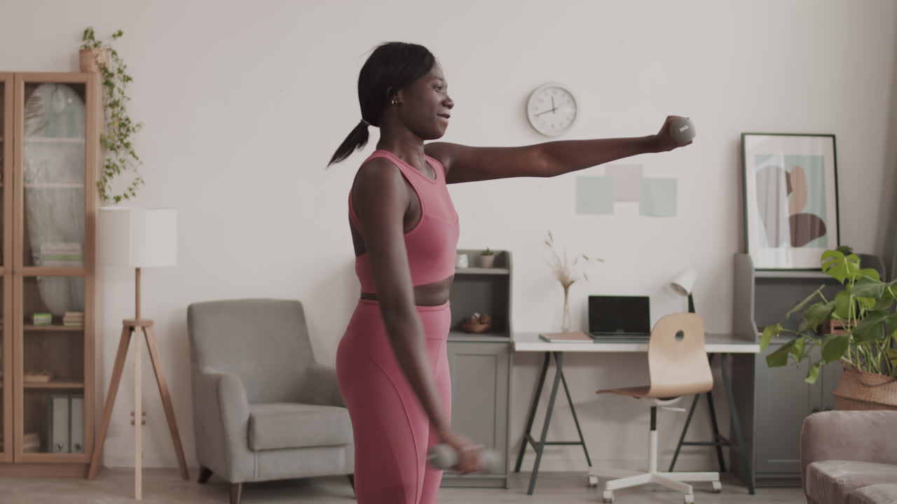 African Sportswoman Exercising at Home