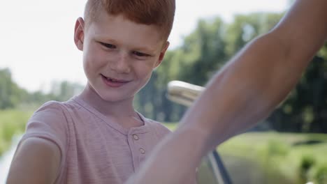 video of boy choosing dish from the barbecue grill