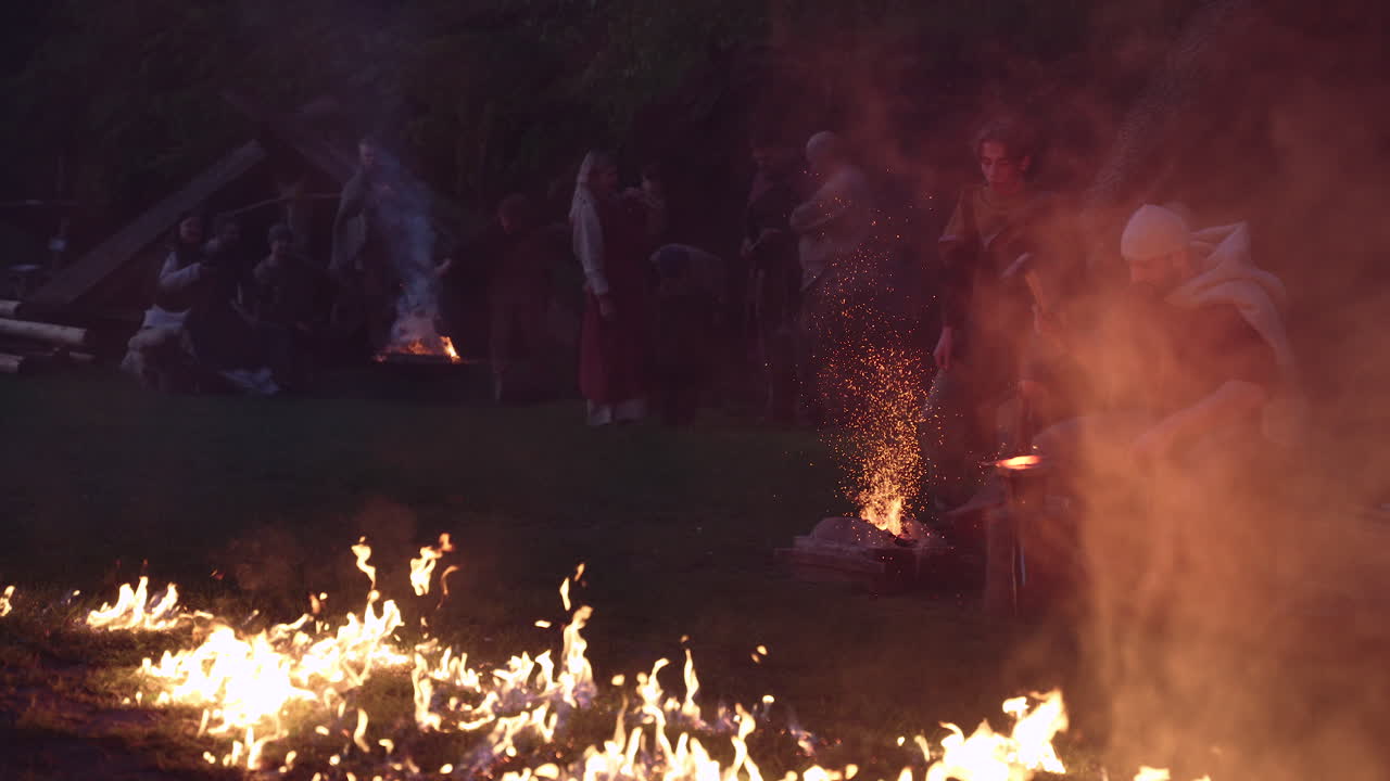 Medieval blacksmith demonstration at night