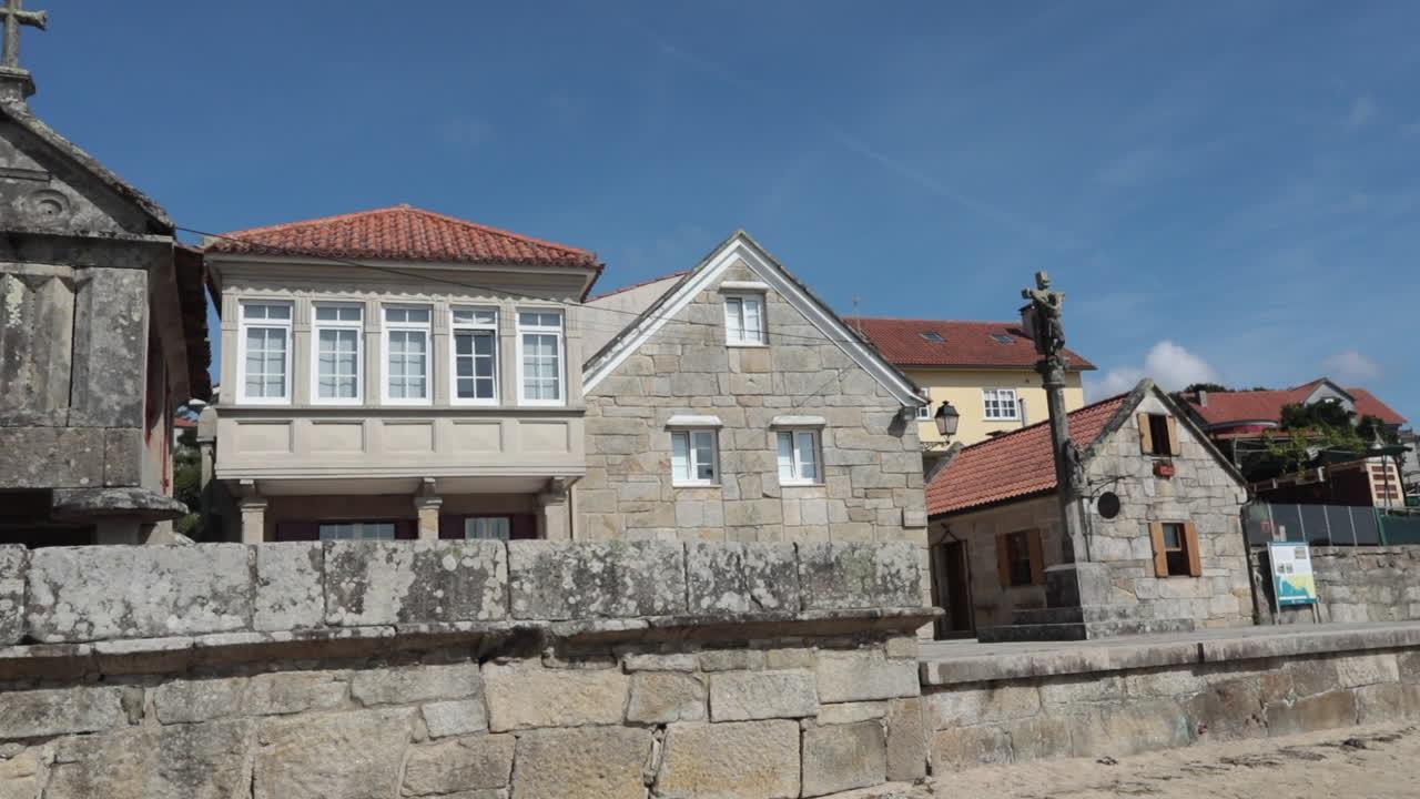 Traditional Stone Houses and Religious Buildings in a Galician Village