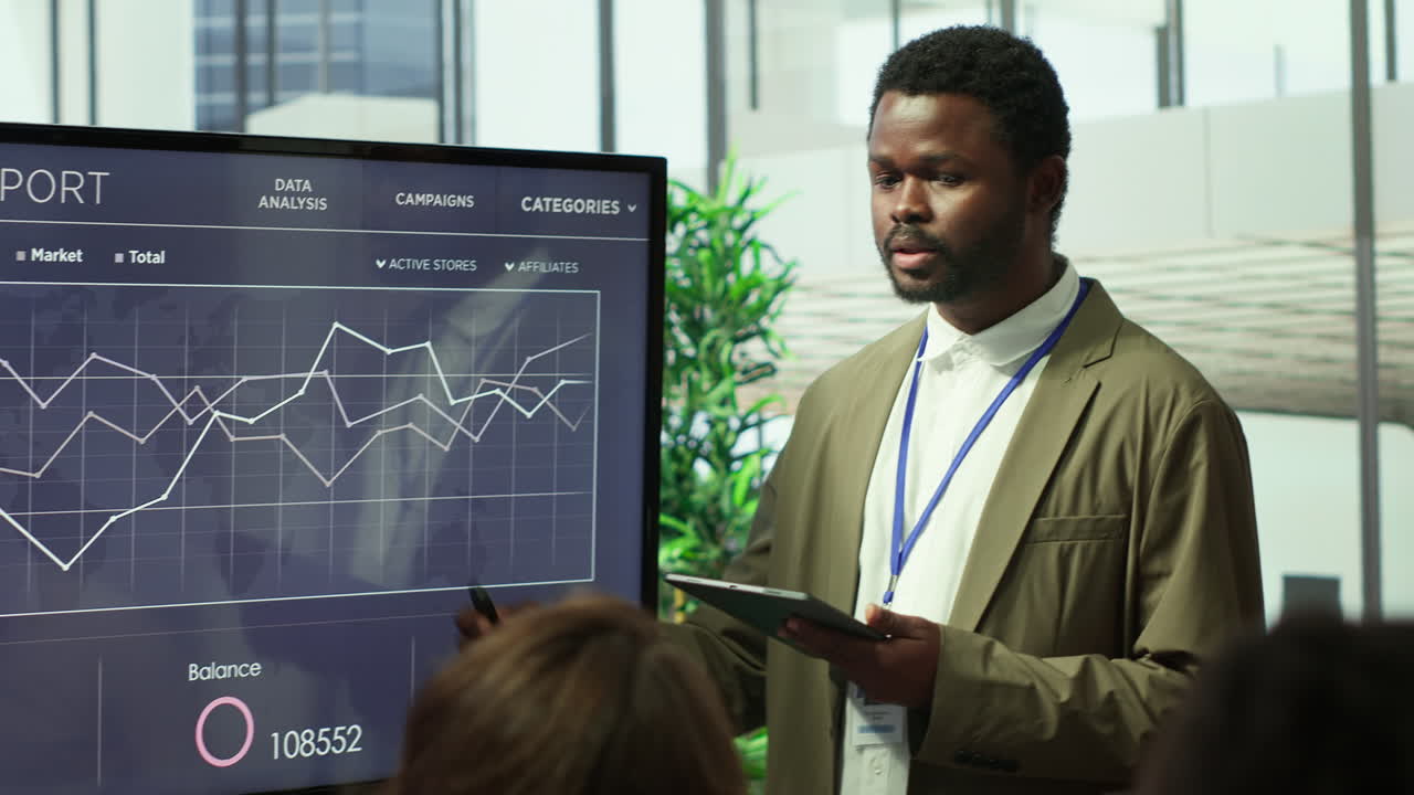 CEO and management team gathering in boardroom for a project briefing