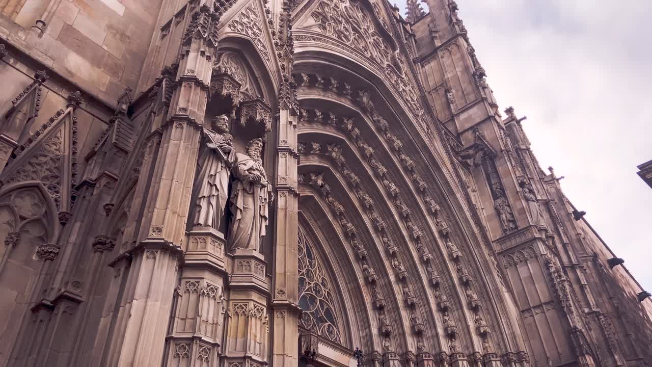Exterior Of The Historical And Gothic Cathedral Of Barcelona In Catalonia, Barcelona, Spain. -  pan up