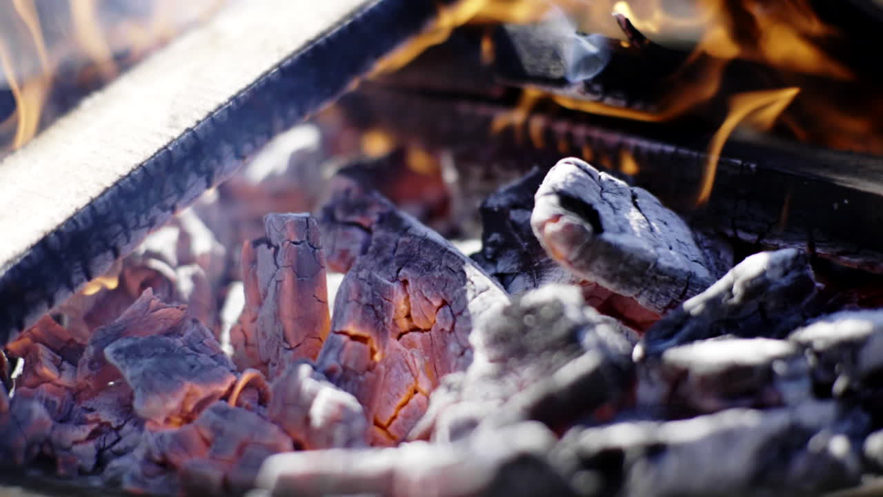 Close-up of burning charcoal and wood