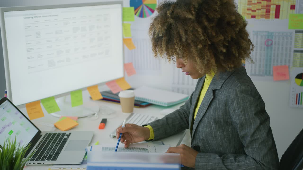 Young businesswoman working with documents