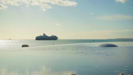 cruise ship on the horizon from infinity pool