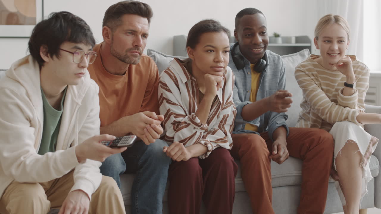 Friends Watching Captivating TV Program