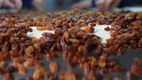 Shot-of-the-hands-of-workers-cleaning-the-grapes-on-the-sorting-table