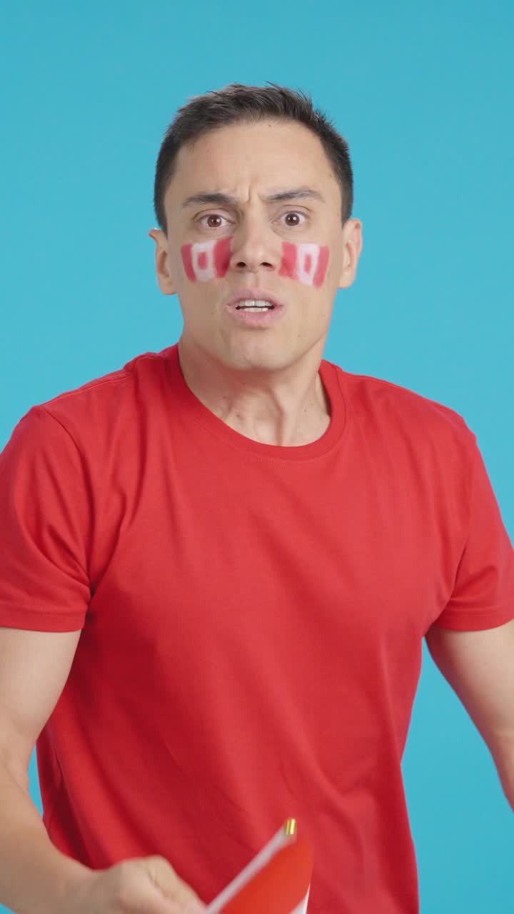 Man Cheering for Canada, angry with the decision of referee