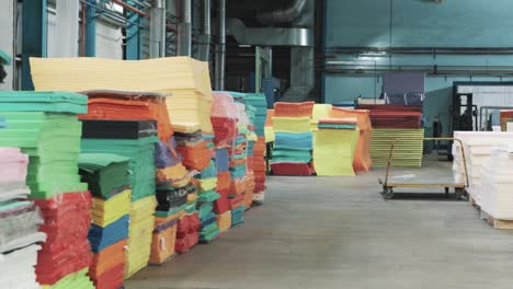 Composition-view-of-various-colored-textile-and-foam-materials-for-manufacturing-mattresses-and-other-textile-products