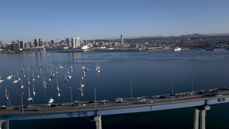 aerial view of coronado bridge, san diego bay, and city skyline