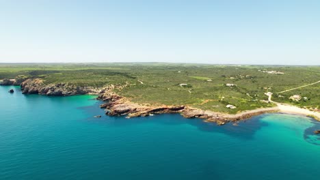 stunning landscape of blue sea, cove and beach in summer. - aerial shot