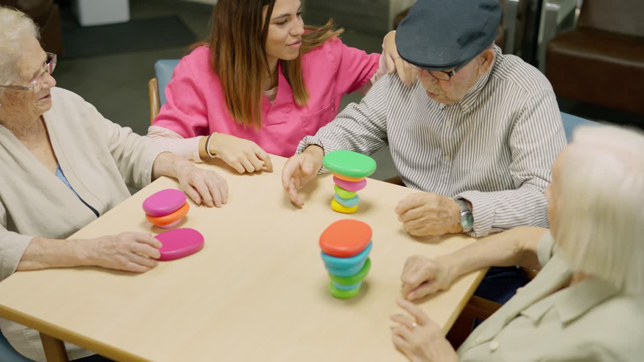 Seniors playing a stacking game