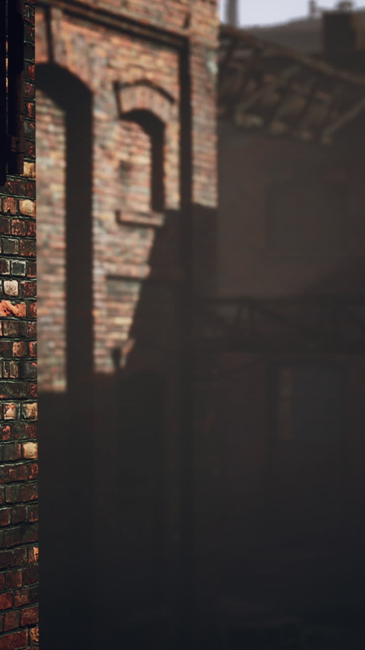 건물의 그림자를 가진 벽돌 벽