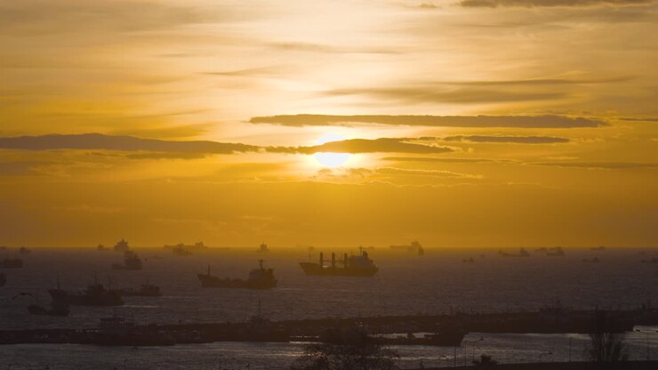 Sunset Over a Busy Port
