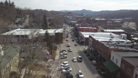 aerial pull out flying down king street in boone north carolina