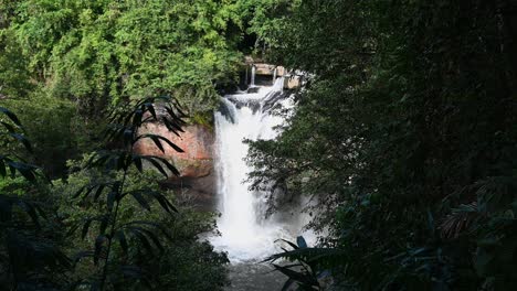 a gorgeous waterfalls seen from a higer ground showing a dramatic perspective, heo suwat waterfall, khao yai national park, thailand