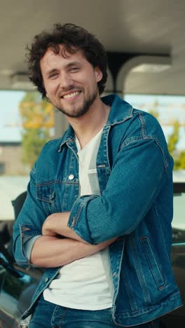 smiling man at gas station
