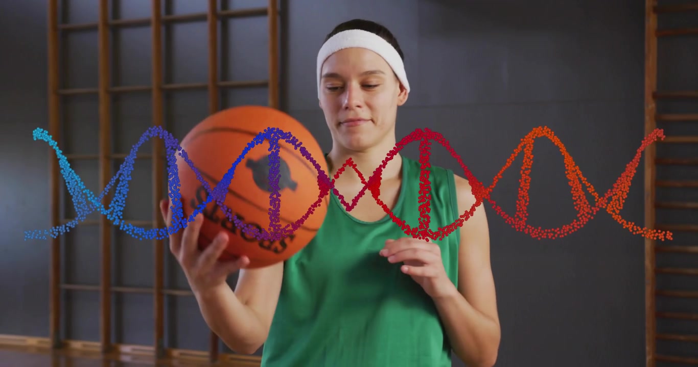 Atleta femenina moviendo un balón de baloncesto que gira en la punta de su dedo mientras una hélice pulsa en una demostración educativa.