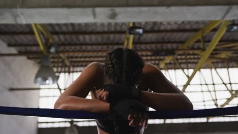 woman resting after working out in voxing club