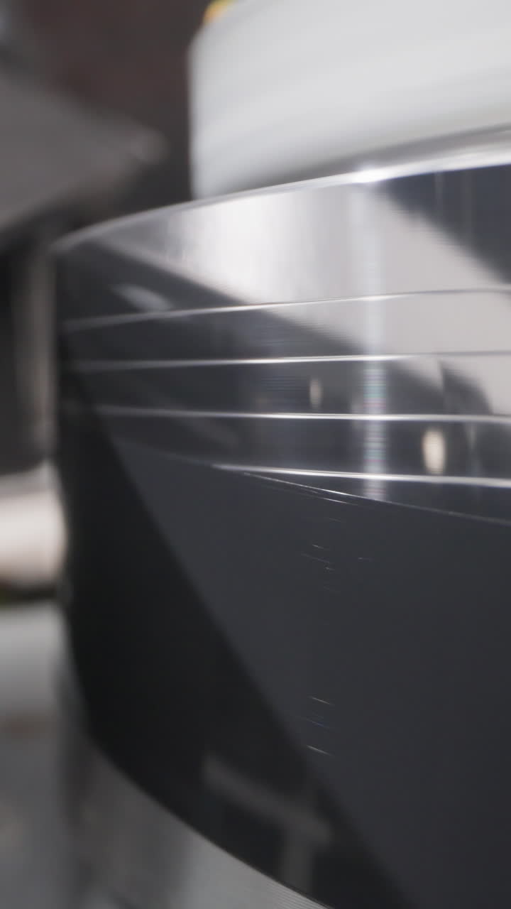 Videotape recorder mechanism operates extreme close view. Vintage analog device operations to watch video. Video appliance and electric technology