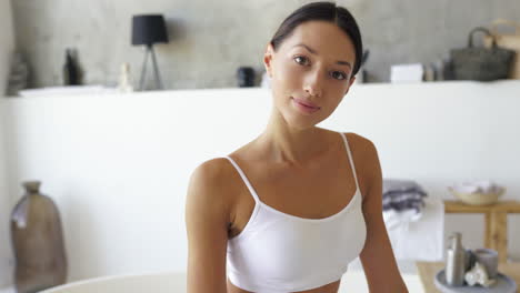 woman relaxing in a modern bathroom