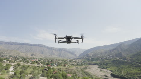 drone flying over mountain valley