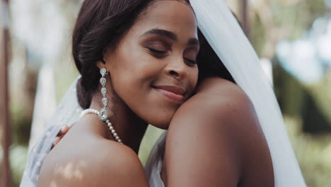 Lesbian,-marriage-and-couple-hug-at-wedding