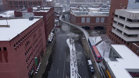 the people mover train operates in downtown detroit, aerial drone view