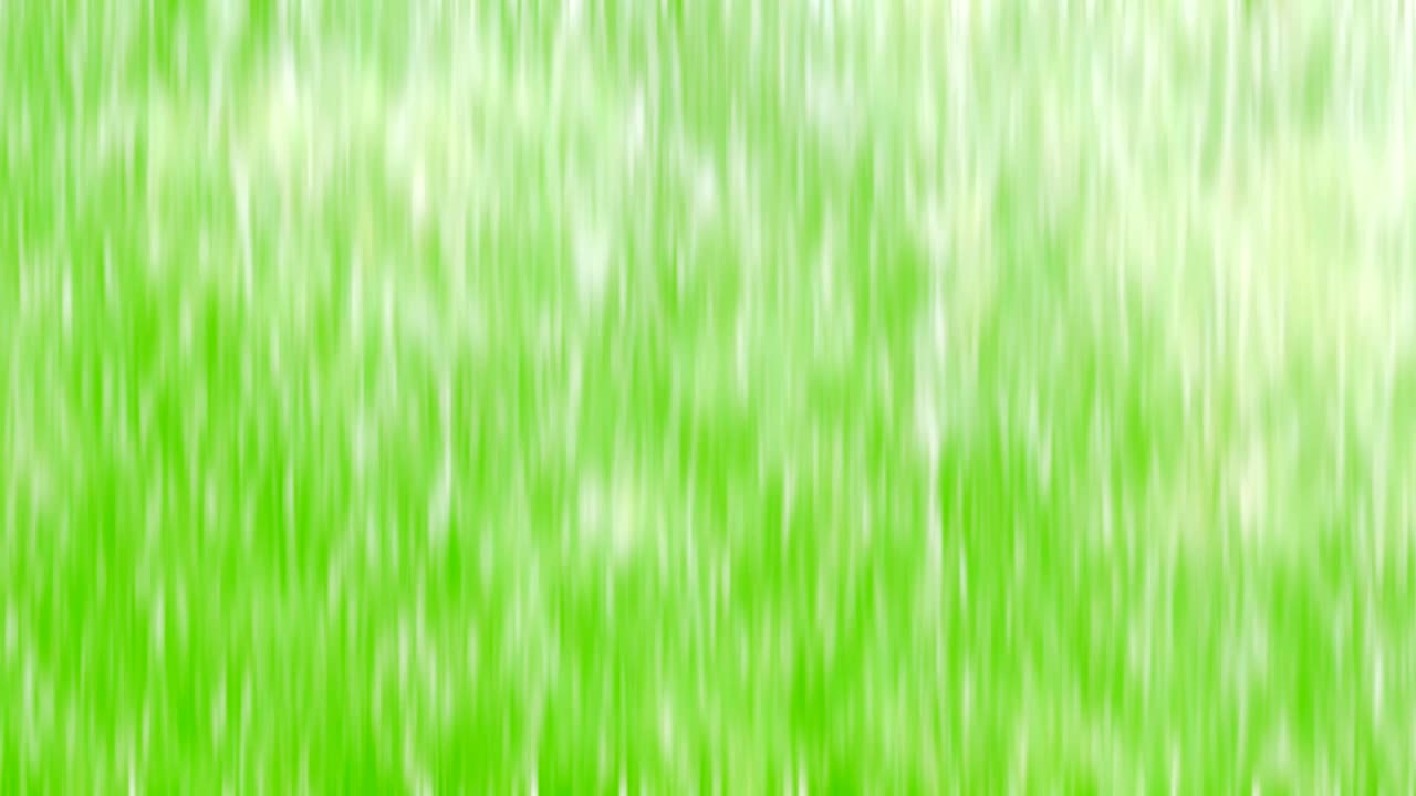 녹색 화면 배경에서 비가 느리게 떨어집니다.