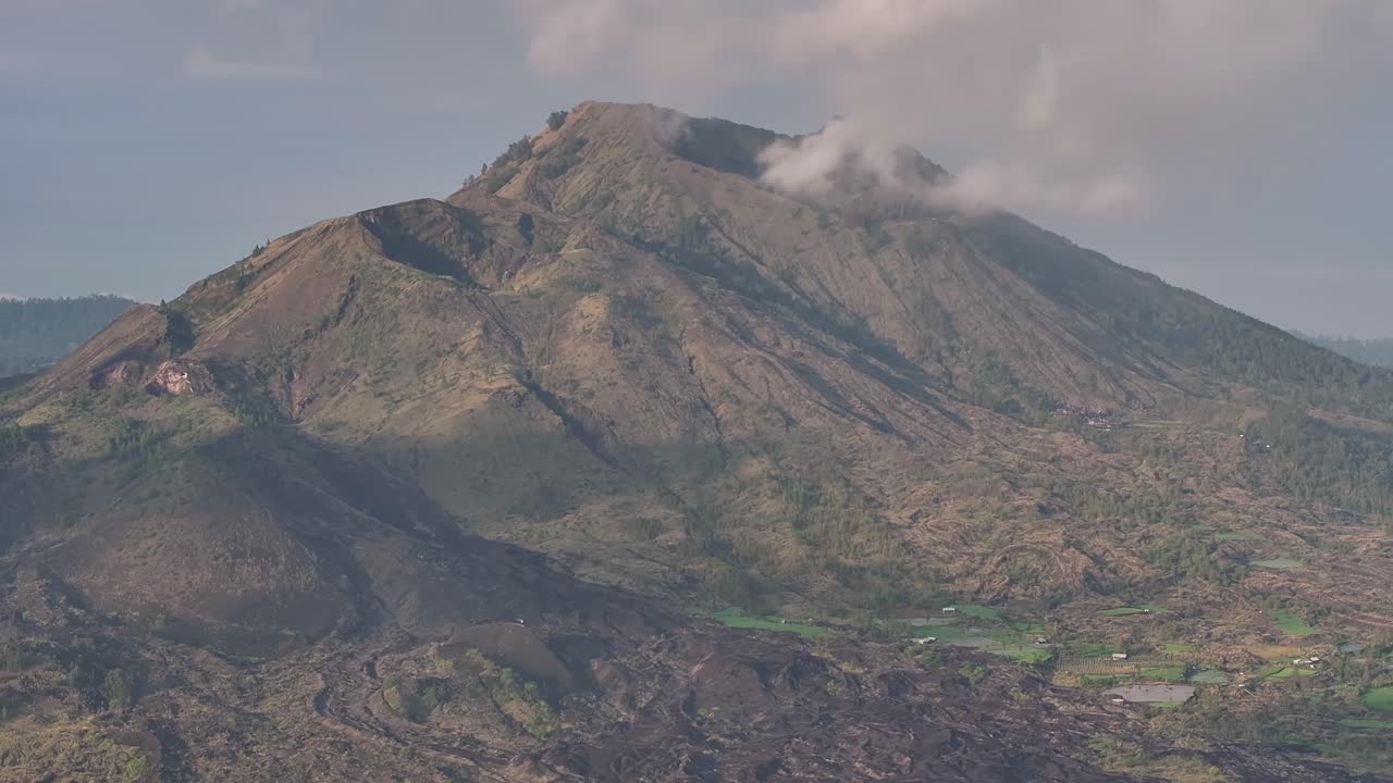 Drone close up of Mount Batur active volcano in North Bali, Indonesia. Natural landmark