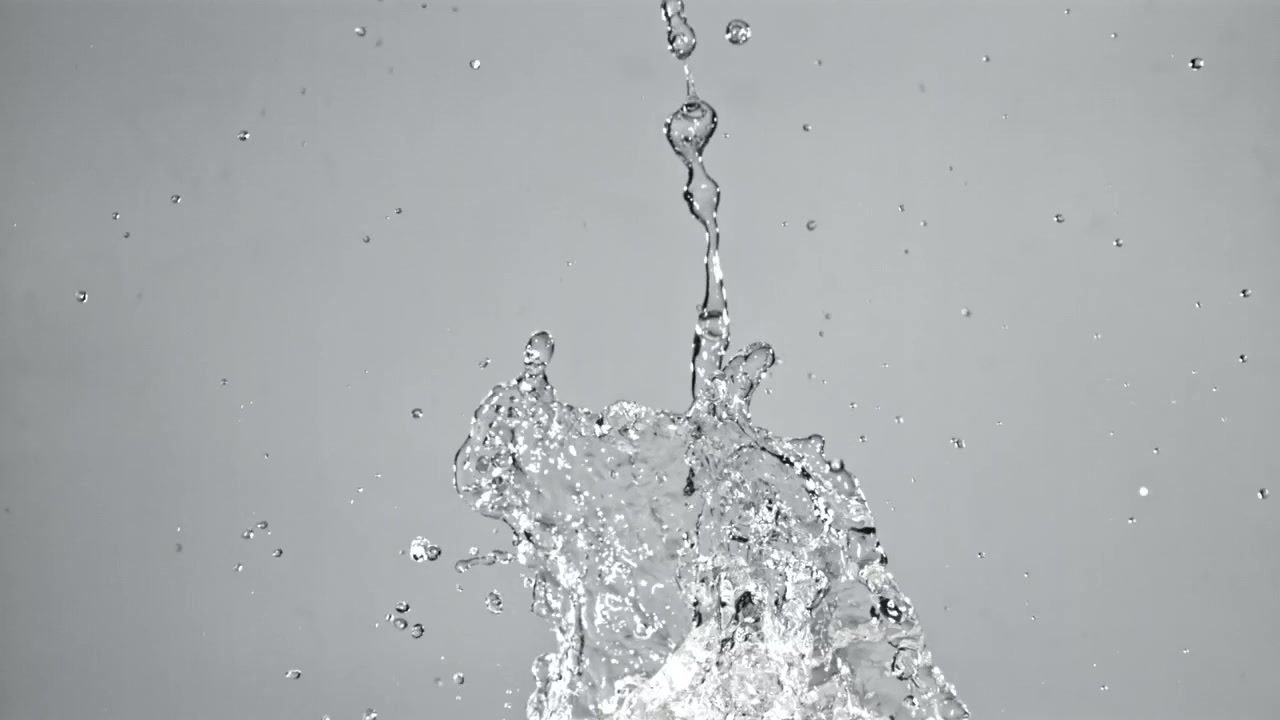 Dynamic Water Splash and Stream Pouring in Slow Motion