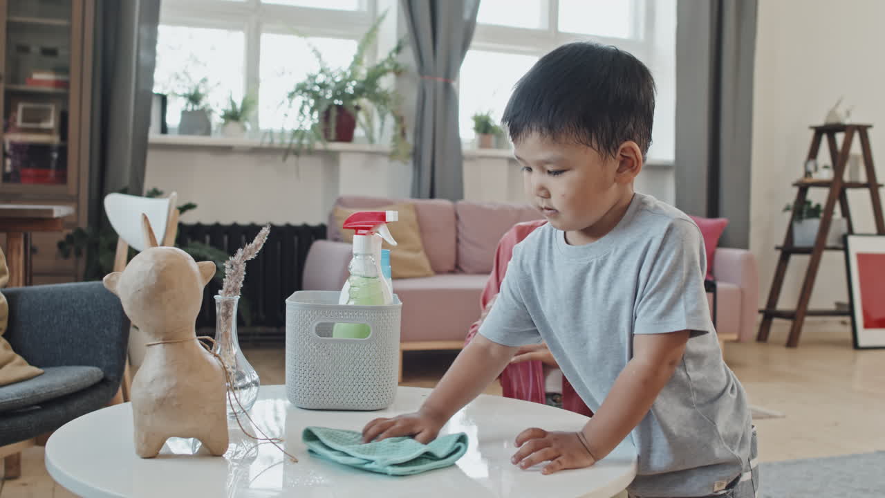Asian Mom and Son Doing Housework Together