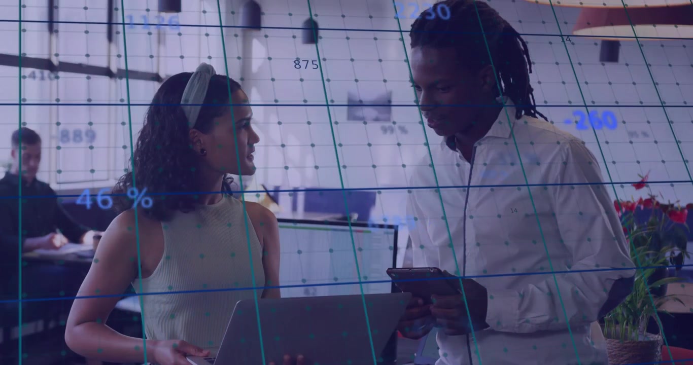 Woman angling laptop, showing business data, blue readouts overlaying, he scrolling phone, checking