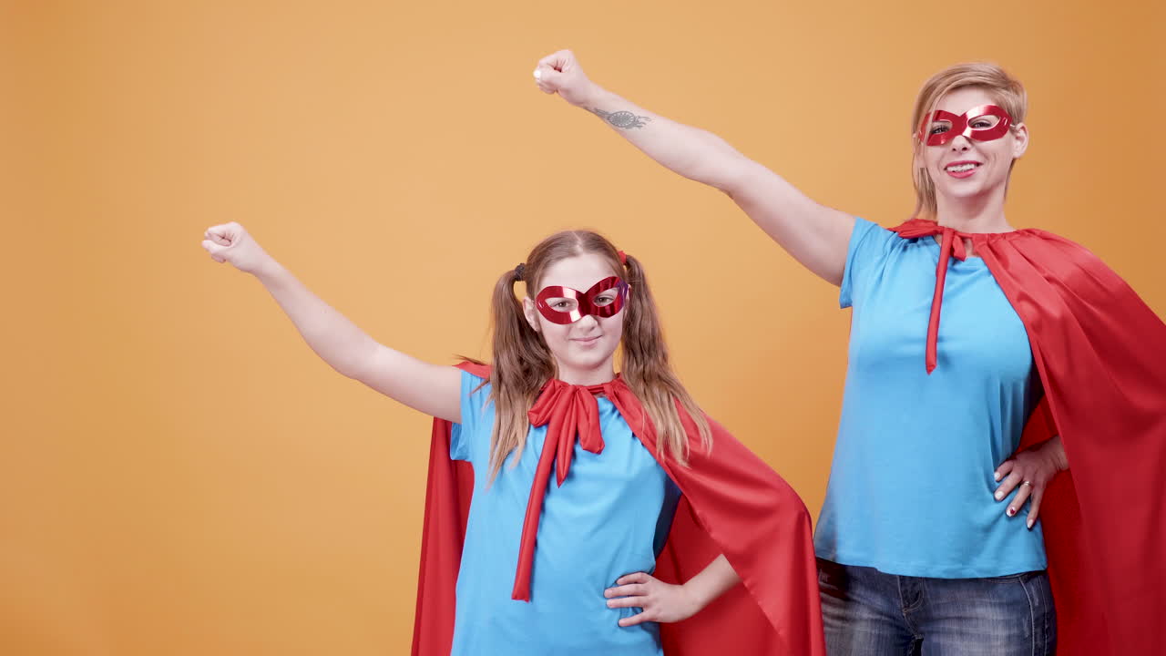 Superhero Mother and Daughter Studio Portrait