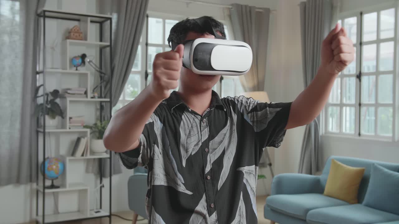 Teenager using VR headset at home